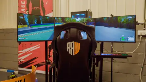 Immerse yourself in GT racing with a triple-screen setup. 